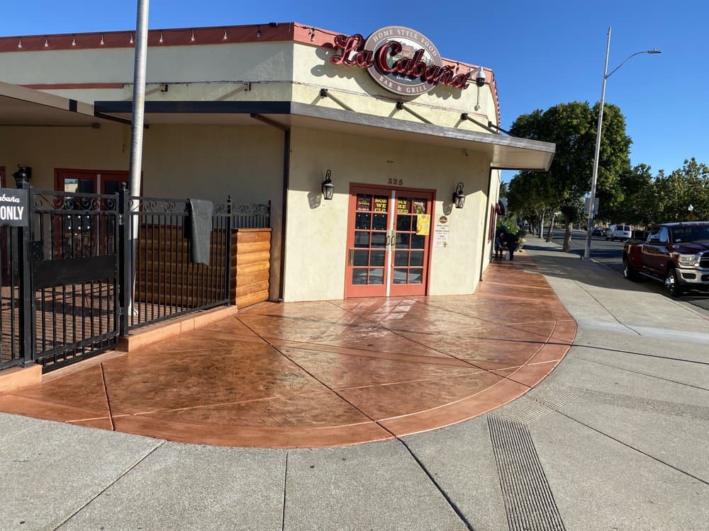 Finished decorative concrete work by J C Garden Tree Service.