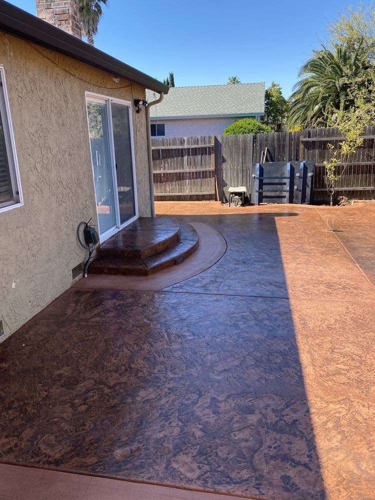 Fresh concrete work by J C Garden Tree Service.